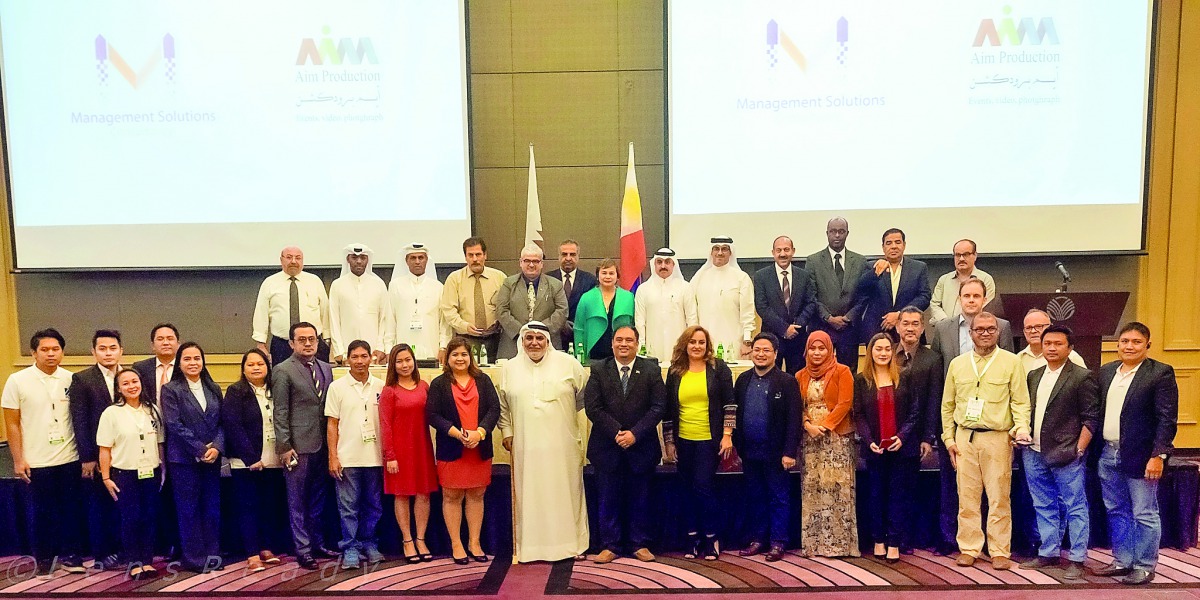 Officials pose for a group picture.