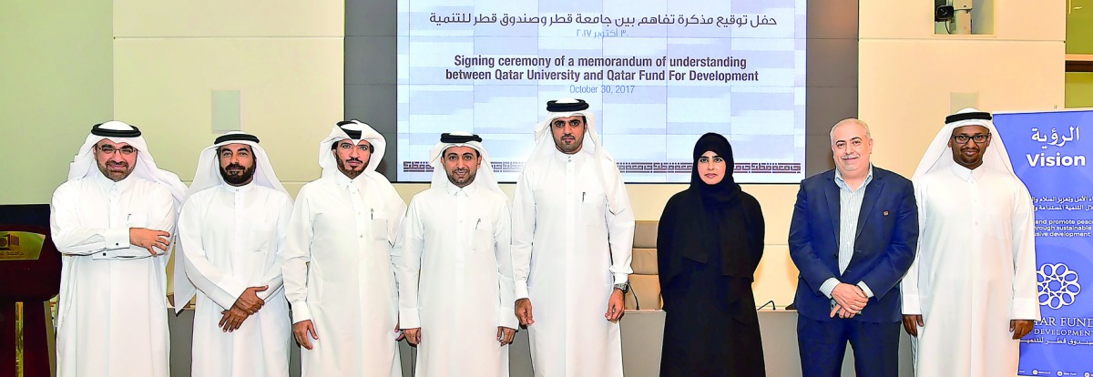 Officials at the signing ceremony.