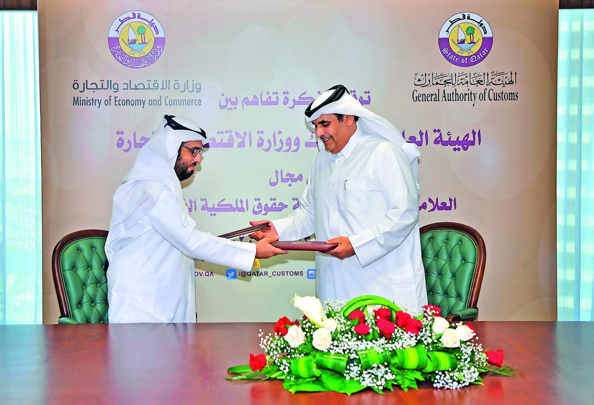 Assistant Undersecretary for Commercial Affairs at the Ministry of Economy and Commerce, Yahya bin Saeed Al Nuaimi, and GAC Assistant Chairman, Ahmed bin Issa Al Muhannadi, at the signing of the MoU at the authority’s headquarters.