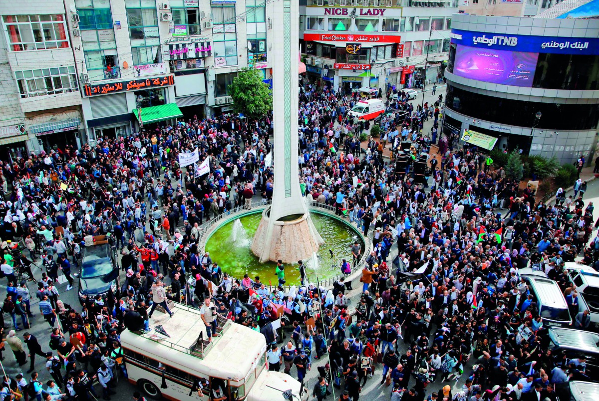 Palestinians participate in a march in the centre of the West Bank city of Ramallah to protest the 100th anniversary of Britain’s Balfour Declaration, which helped lead to Israel’s creation and the Israeli-Palestinian conflict. 