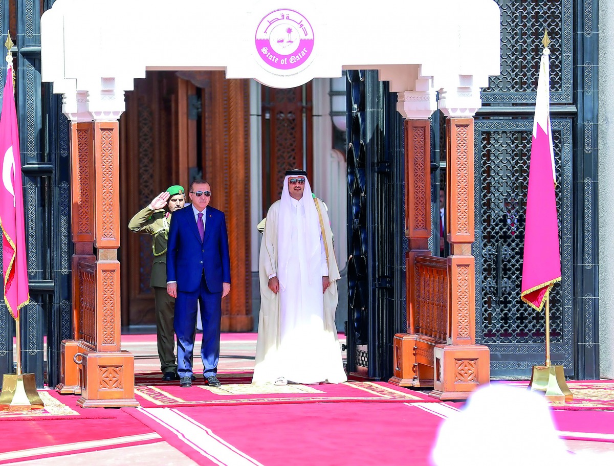 Emir H H  Sheikh Tamim bin Hamad Al Thani with the President of Turkey H E Recep Tayyip Erdogan at the Emiri Diwan, yesterday.