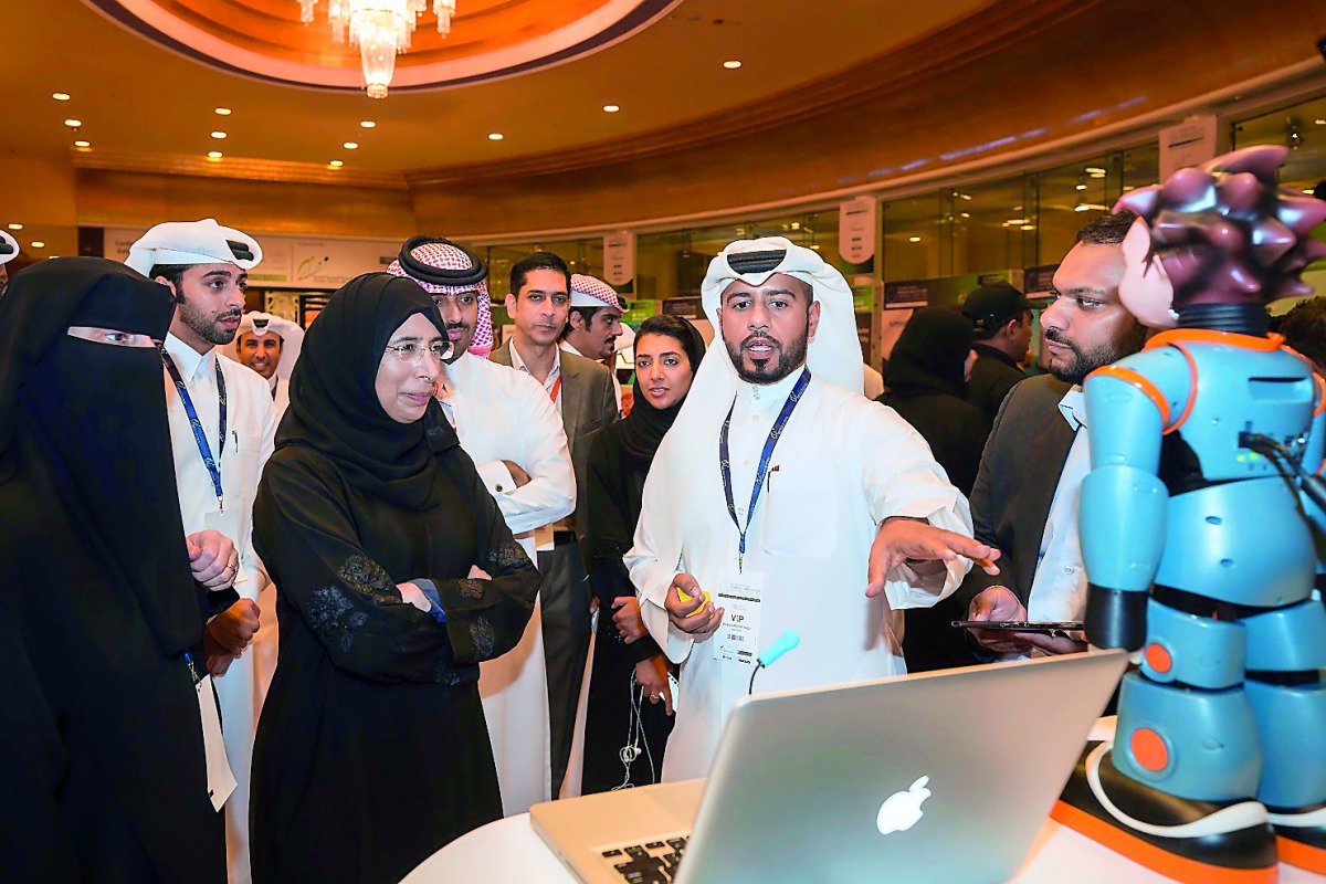 Minister of Public Health H E Dr Hanan Mohamed Al Kuwari visiting the Ooredoo stand with senior executives.