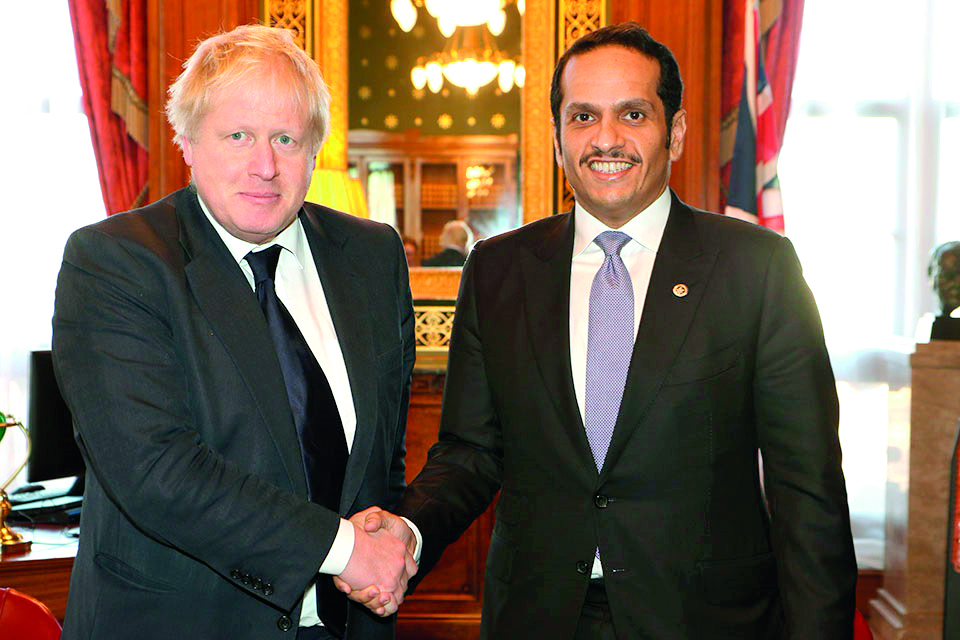 Deputy Prime Minister and Foreign Minister H E Sheikh Mohamed bin Abdulrahman Al Thani with UK Foreign Secretary Boris Johnson in London yesterday. Bilateral ties and ways to enhance them, in addition to development in the GCC and the region were discusse