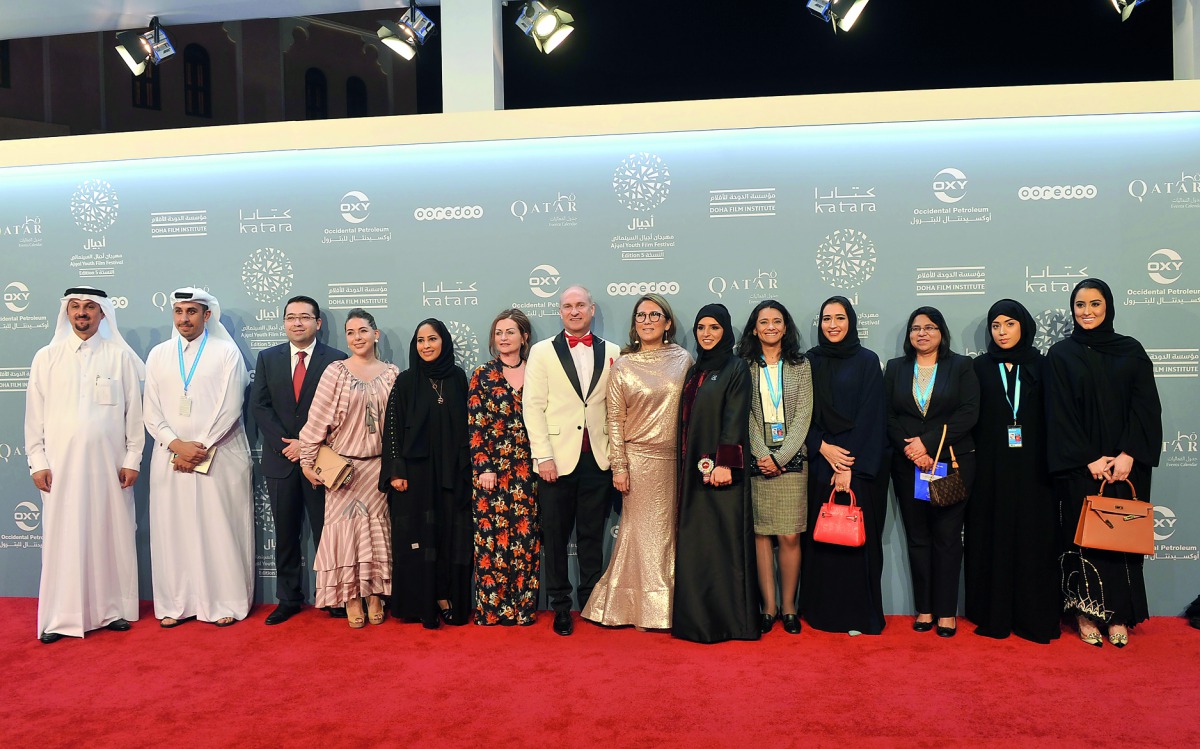 Fatma Al Remaihi (sixth right), Festival Director and Chief Executive Officer of Doha Film Institute, with other officials at the Red Carpet of Ajyal Film Festival opening at Katara yesterday.
Pic: Kammutty VP / The Peninsula 