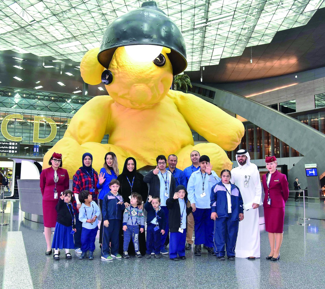 Some of the children who took part in the tour with teachers and airport officials a the Hamad International Airport in Doha.