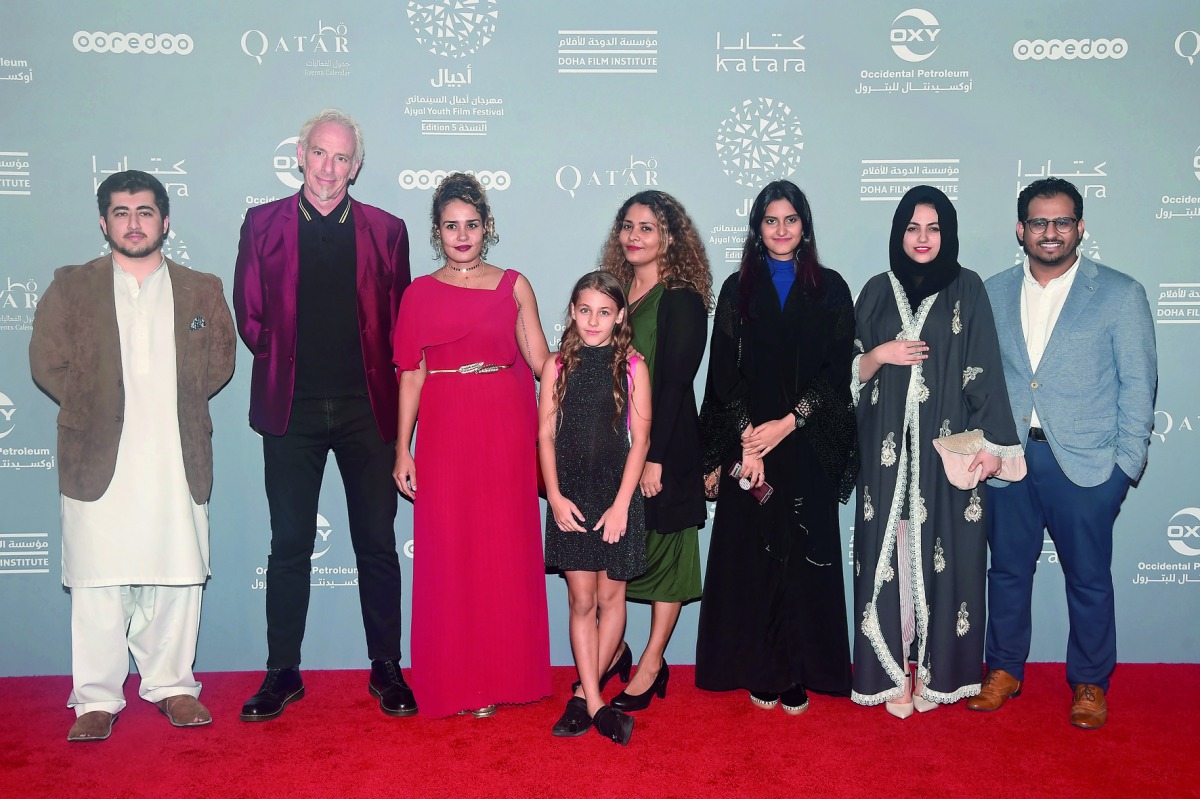 Georgetown University students and CIRS filmmaker Suzi Mirgani pose for a photograph at Ajyal Film Festival. 