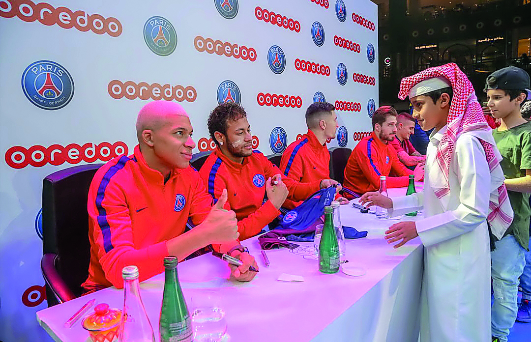 Five Paris Saint-Germain players — Neymar Jr, Kylian Mbappé, Marco Verratti, Thomas Meunier and Kevin Trapp — sign merchandise and greeting children at the camp at the Mall of Qatar. 