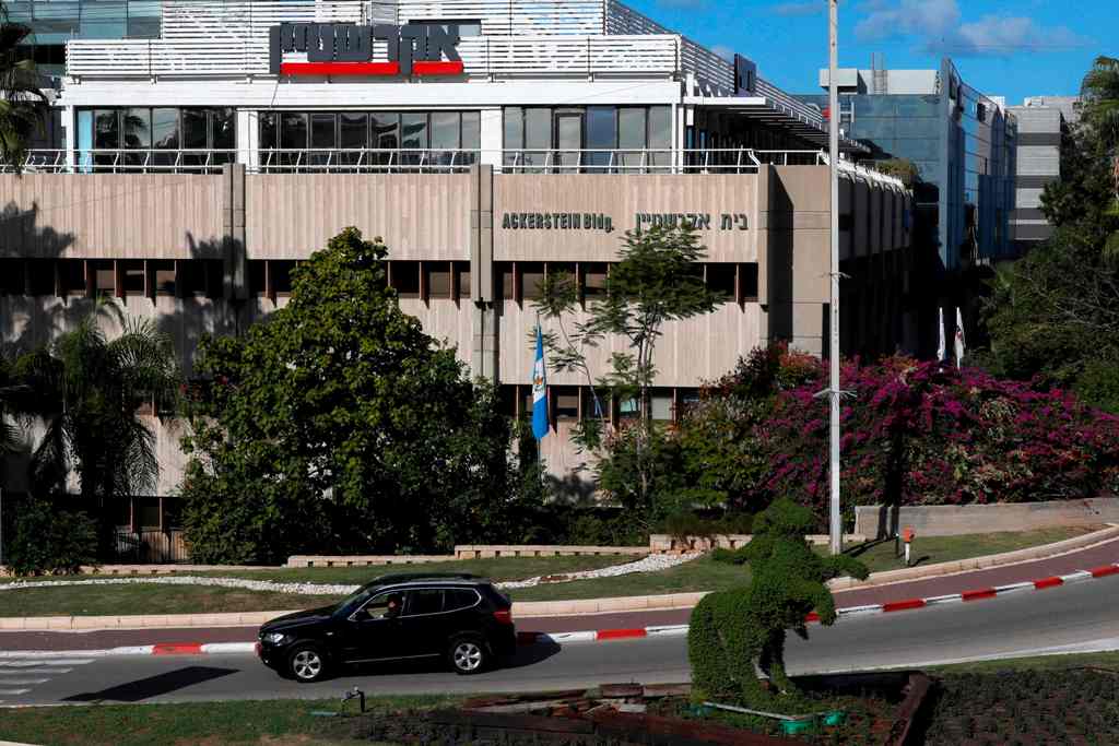 A picture was taken on December 25, 2017, shows Guatemalan flag hanging outside the building housing the offices of the Central American Embassy, in the city of Herzliya, near Tel Aviv. / AFP / JACK GUEZ