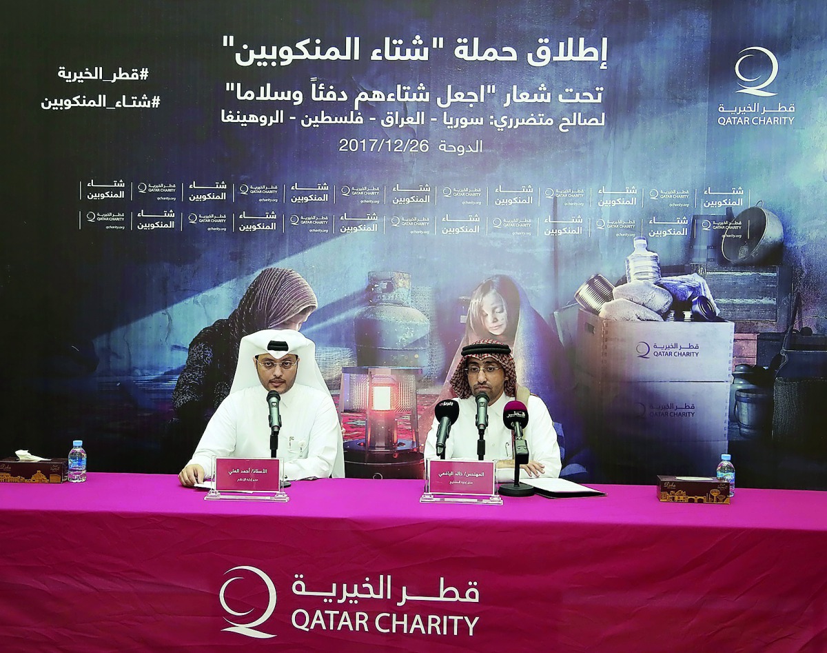 Qatar Charity’s Projects Executive Manager Khaled Abulla Al Yafei and Media Department Manager Ahmed Saleh Al Ali addressing a press conference to launch the “Winter for the Needy” campaign at the headquarters of the Qatar Charity, yesterday. 
