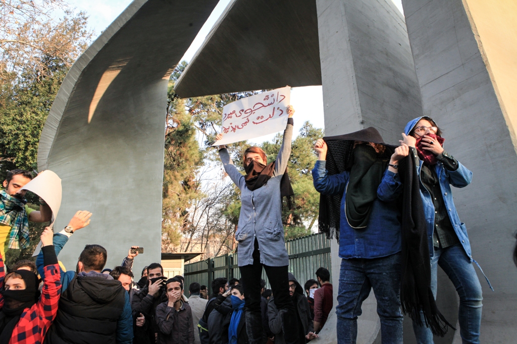 People gather to protest over the high cost of living in Tehran, Iran on December 30, 2017. Stringer - Anadolu 
