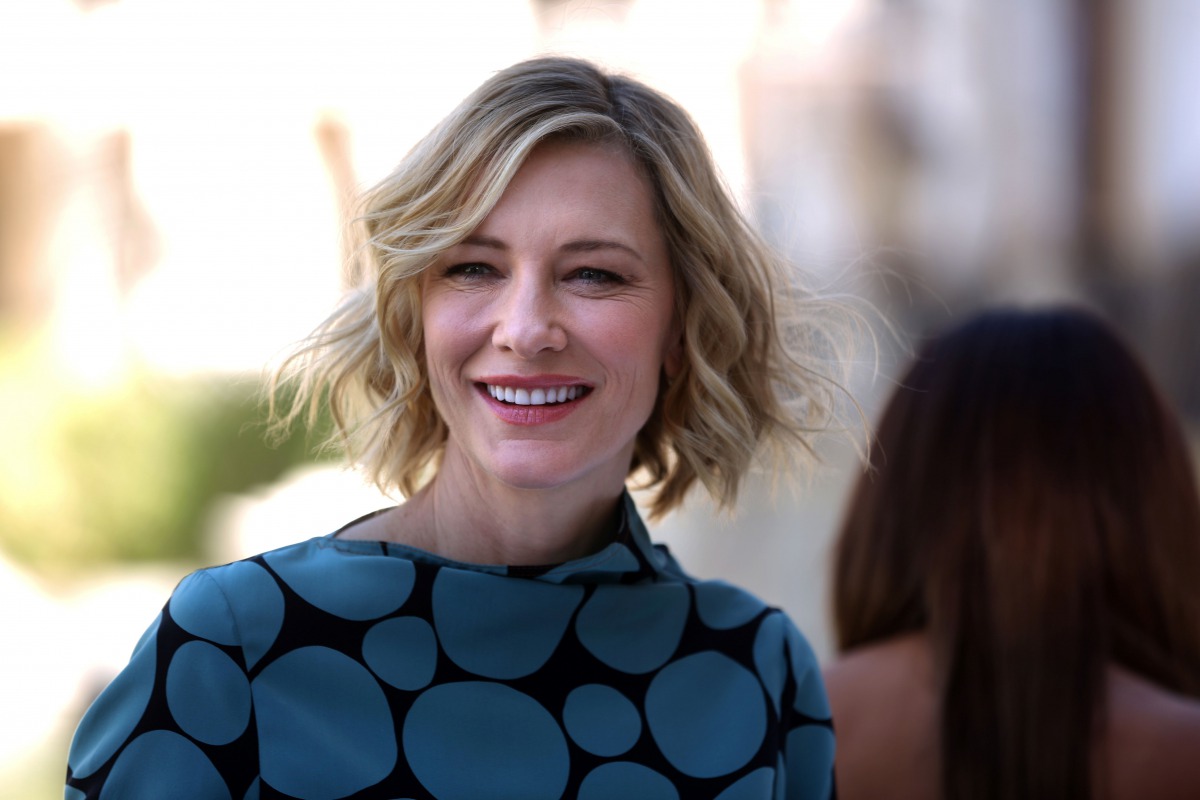 (FILES) This file photo taken on December 07, 2017 shows Australian actress Cate Blanchett smiling during a photo call in Dubai. AFP / PATRICK BAZ