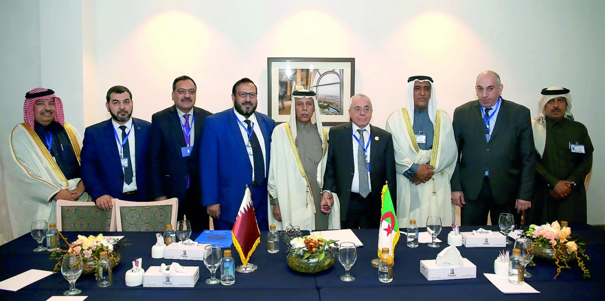 H E Ahmed bin Abdullah bin Zaid Al Mahmoud with heads of Parliamentary Councils.
