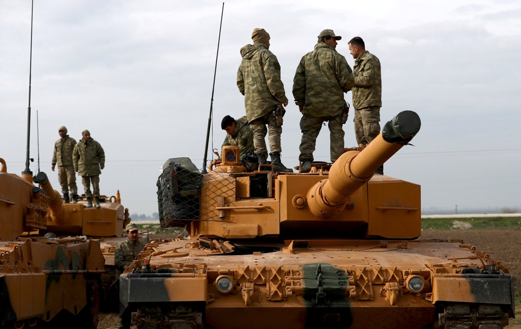 Turkish soldiers prepare their tanks near the Syrian-Turkish border, at Reyhanli district in Hatay, Turkey, 21 January 2018. EPA/SEDAT SUNA
