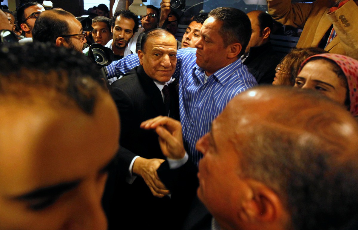 FILE PHOTO: Egypt's former army chief of staff Sami Anan, leaves a news conference at his office in Cairo, March 13, 2014. Reuters/Mohamed Abd El Ghany