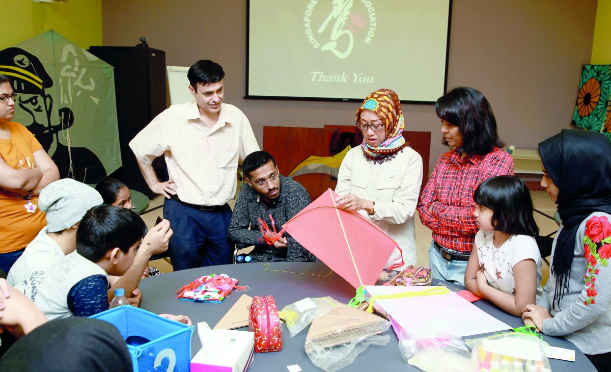 Singaporean trainer, Gadis Riyadi, giving demonstrations for the upcoming Aspire International Kite Festival, yesterday. PIC: Qassim Rahmatullah / The Peninsula