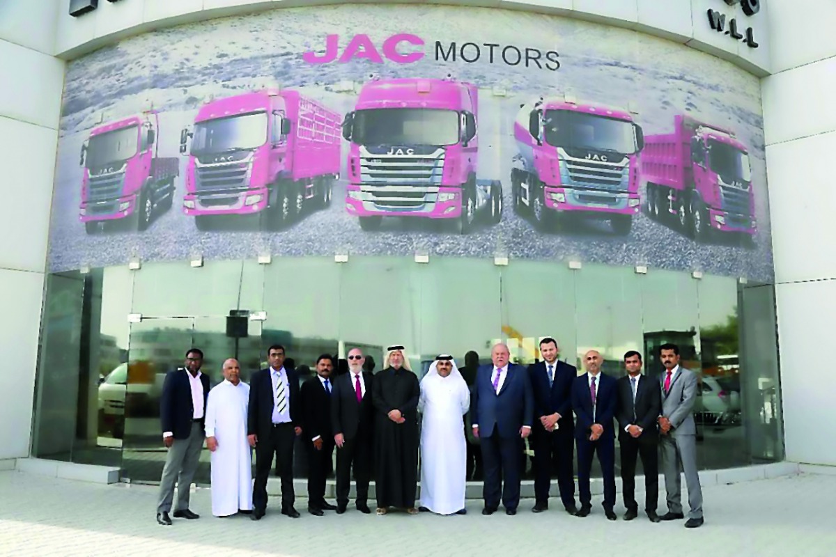 Officials of Al Hamad Automobiles Co and Al Meera during JAC trucks delivery. 