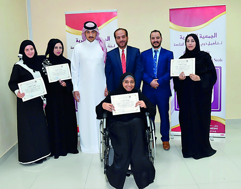 Participants and officials during the training organised by Qatar Foundation For Rehabilitation Of Special Needs. 
