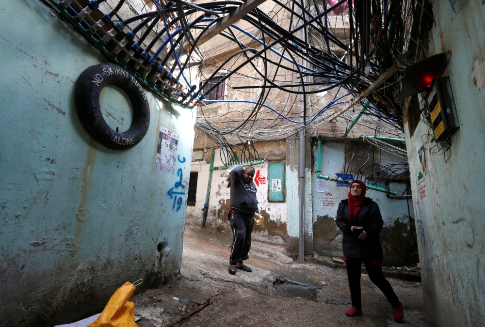People walk in Burj al-Barajneh refugee camp in Beirut, Lebanon, January 29, 2018. Picture taken January 29, 2018. REUTERS/Mohamed Azakir