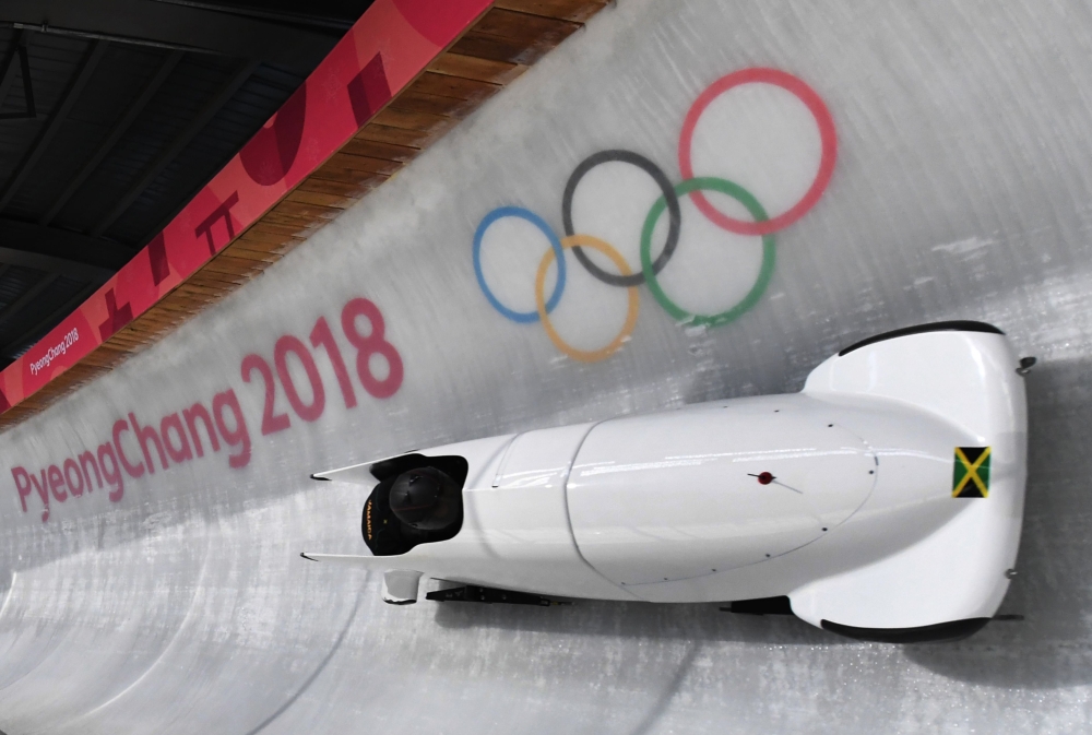 Team leader and driver Jazmine Fenlator-Victorian of Jamaica corners in the second women's unofficial bobsleigh training session at the Olympic Sliding Centre, ahead of the Pyeongchang 2018 Winter Olympic Games, in Pyeongchang on February 8, 2018. AFP / M