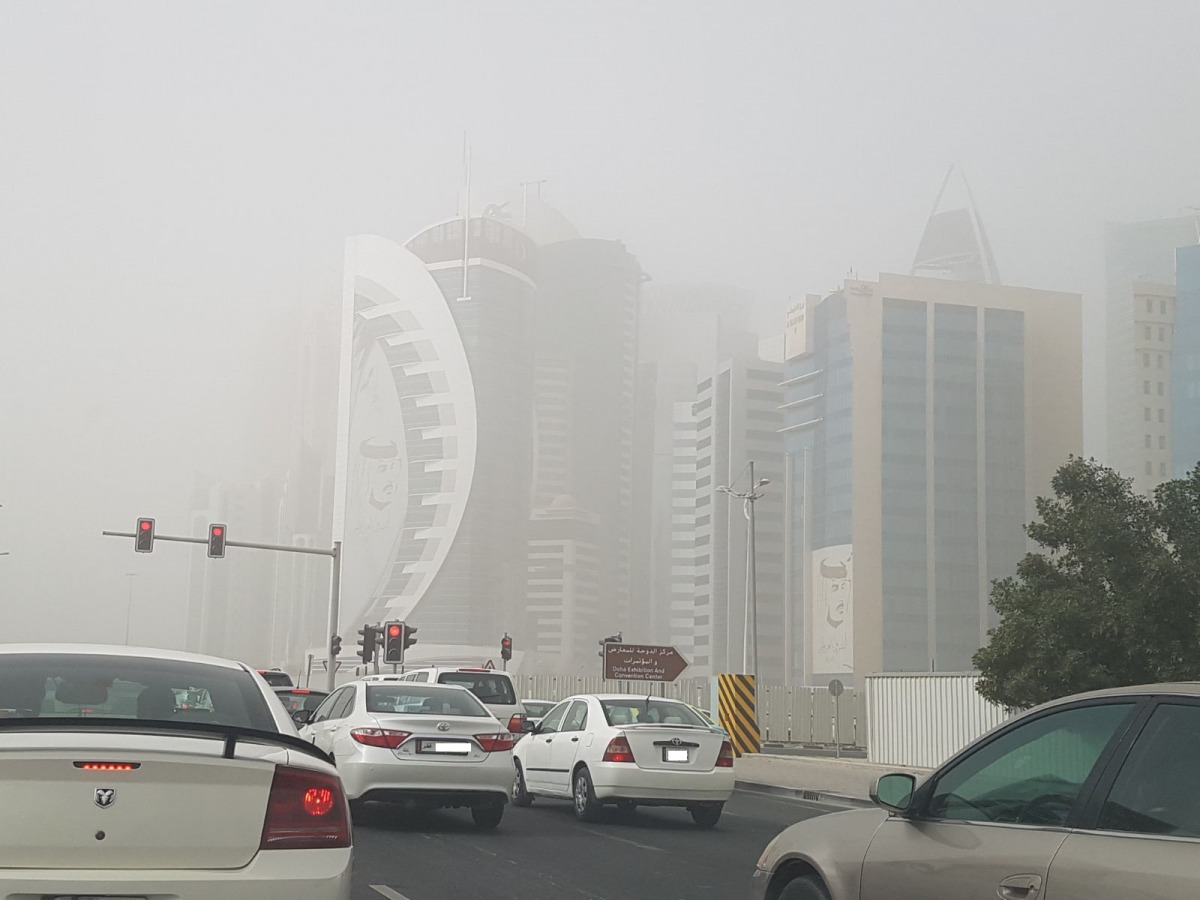 Dust along West Bay on Corniche. Pic: Abdul Basit/ The Peninsula 