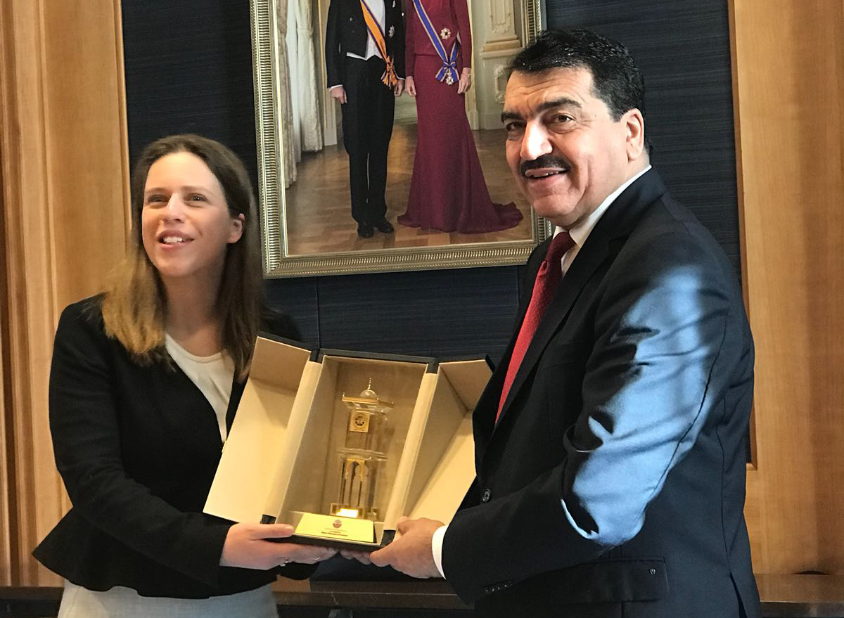 Minister of Municipality and Environment H E Mohammed bin Abdullah Al Rumaihi receiving a memento from Carola Schouten, Minister of Agriculture, Holland, during his visit to Holland. 