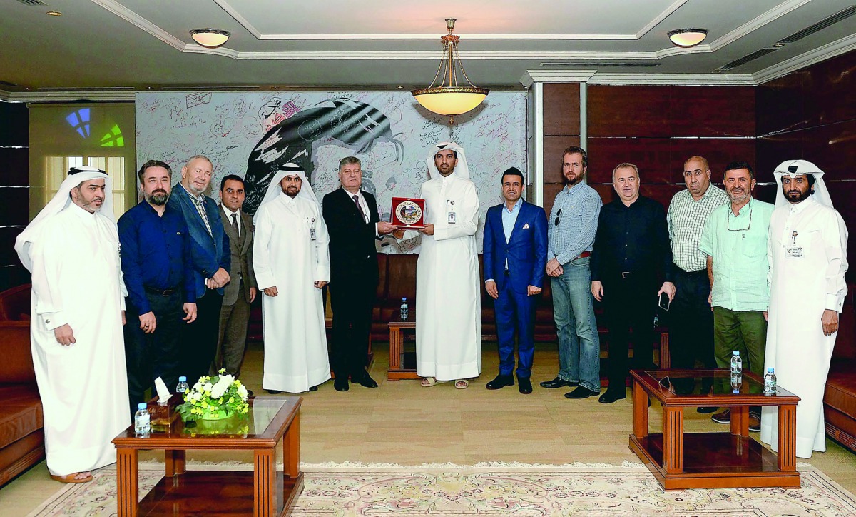 Officials from Al Rayyan Municipality with a Turkish delegation from Ayvacik Municipality, led by Mehmet Unal Sahin and a number of officials from Canakkale Province, during the discussion to promote cooperation and exchange of expertise and experiences b
