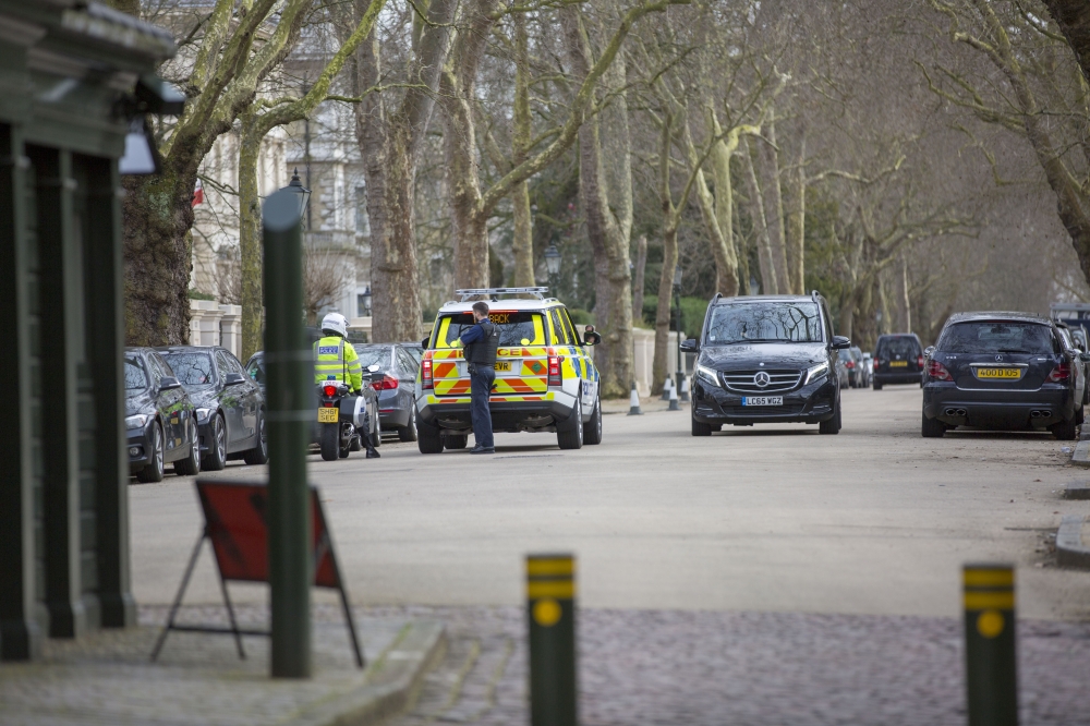 Police officers are seen at Russian Embassy in London, United Kingdom after Britain has expelled 23 Russian diplomats in a standoff with Russia over the 