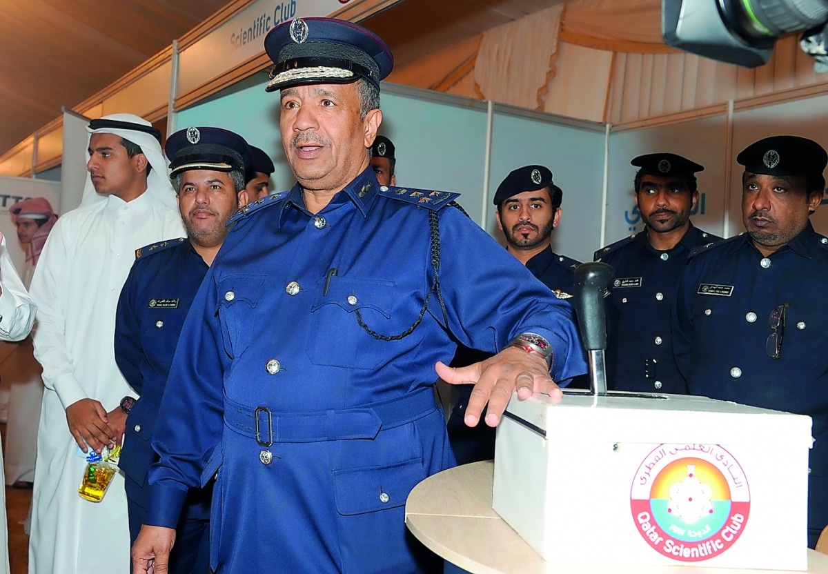 The Director of the General Directorate of Traffic, Brigadier Mohammed Saad Al Kharji, displaying the new device.