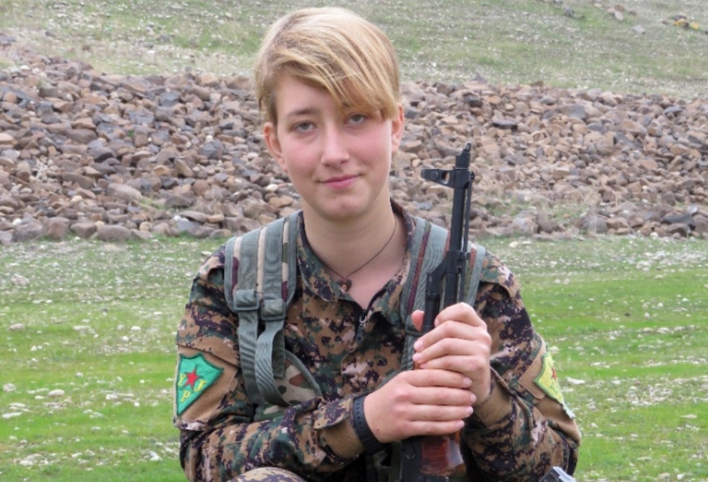 A picture made available by the Women's Protection Units (YPJ) Press office on March 19, 2018, shows British YPJ fighter Anna Campbell posing for a picture at an undisclosed location.
