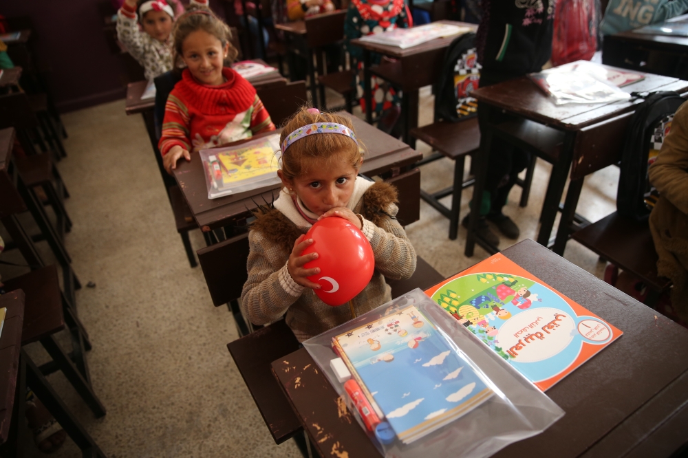 Syrian school children are seen at their classroom al-Caviz village northwestern Syria's Afrin on March 26, 2018. Halil Fidan - Anadolu
