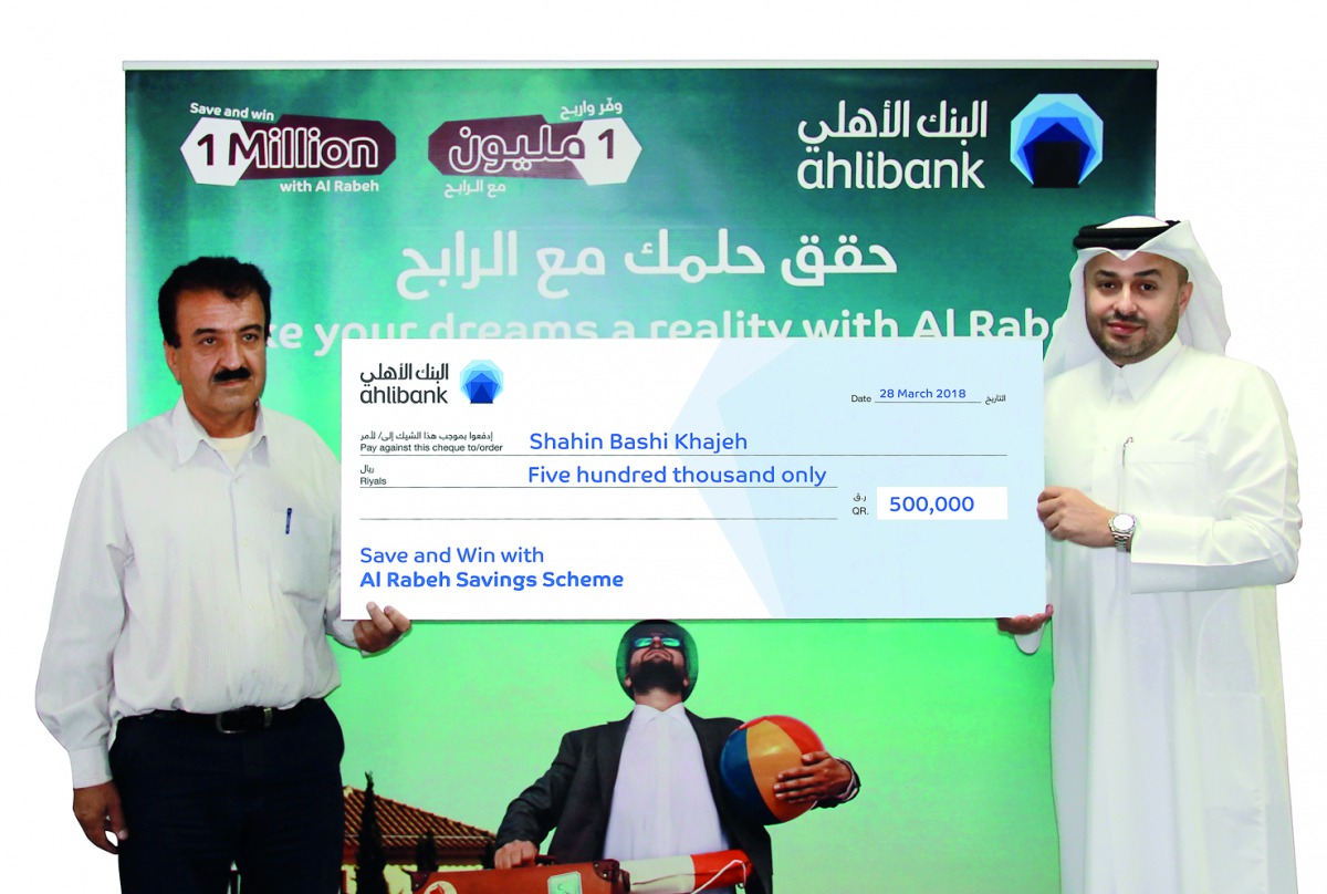 Ahlibank’s Deputy CEO (Retail and Private Banking), Hassan Al Efrangi, presenting the prize money cheque to Al Rabeh winner Shahin Bashi Khajeh. 