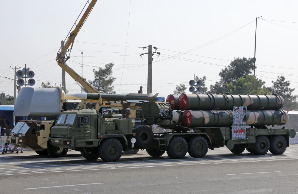 An Iranian military truck carries parts of a S-300 air defence missile system during a parade on the occasion of the country's annual army day on April 18, 2018, in Tehran. AFP / ATTA KENARE
