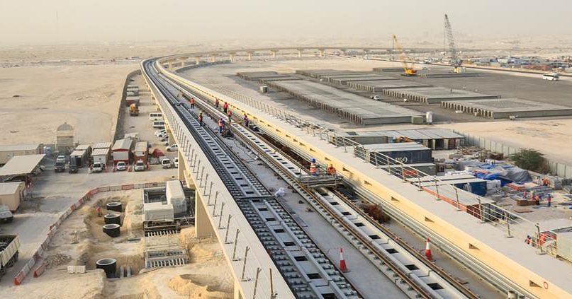 Track works continue along the elevated viaducts of the Metro Red Line near Qatar University.
