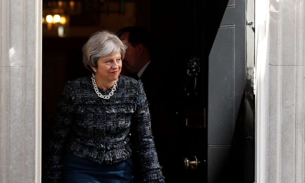 Britain's Prime Minister Theresa May walks out of 10 Downing Street, in London, Britain, April 26, 2018. REUTERS/Peter Nicholls
