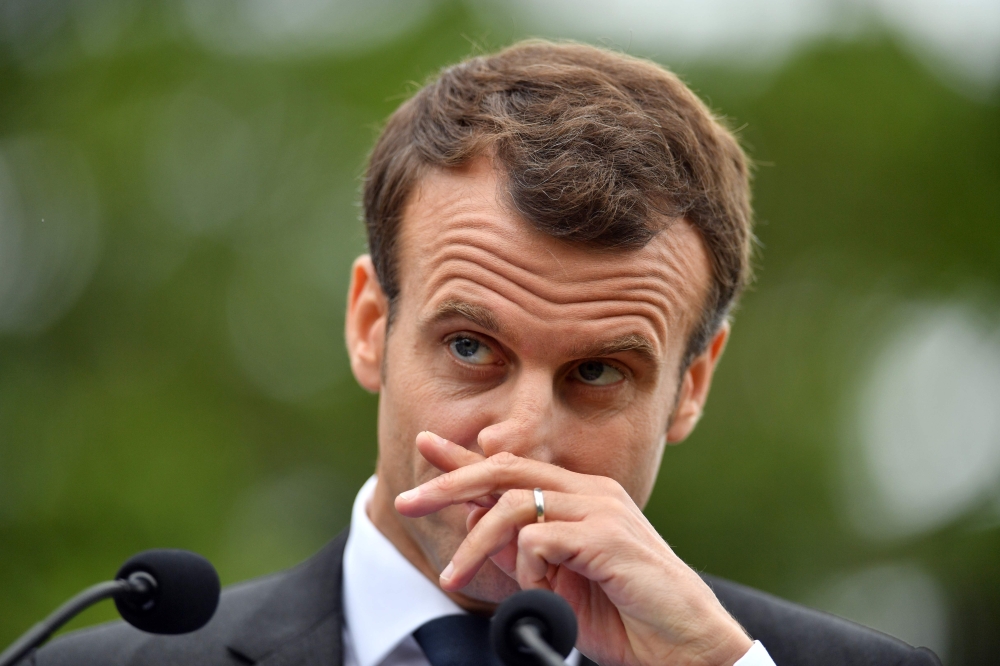 French President Emmanuel Macron listens to a question during a joint press conference with Australian Prime Minister Malcolm Turnbull at Kirribilli House in Sydney on May 2, 2018. AFP / Saeed Khan 