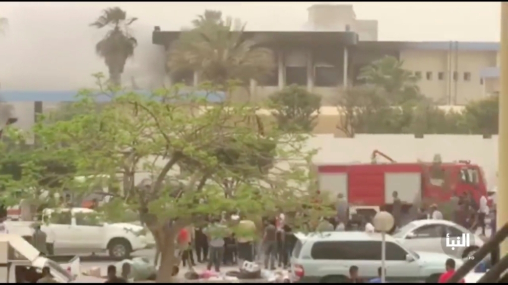The site of suicide attack on Libyan electoral commission is seen in Tripoli, Libya, May 2, 2018 in this still picture obtained from social media video. AL NABAA CHANNEL 
