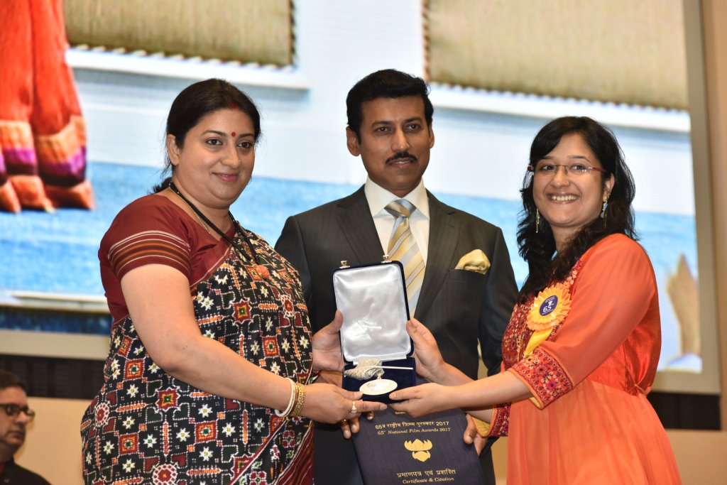 Juhi Bhatt receives the award for best film on social issues (shared) for the movie Veil Done from Information and Broadcasting Minister Smriti Irani 