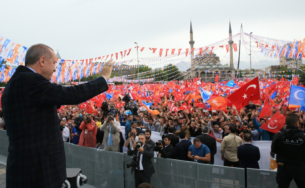 Turkish President Recep Tayyip Erdogan greets the crowd as he attends the 5th Ordinary Congress of ruling Justice and Development (AK) Party’s Women Branch at the Republic Square in Kayseri, Turkey on May 05, 2018.  Turkish Presidency / Murat Cetinmuhurda