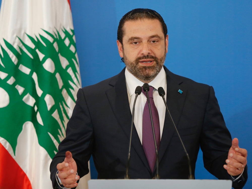 :Lebanese prime minister Saad al-Hariri gestures as he speaks during a news conference in Beirut, Lebanon May 7, 2018. REUTERS/Mohamed Azakir
