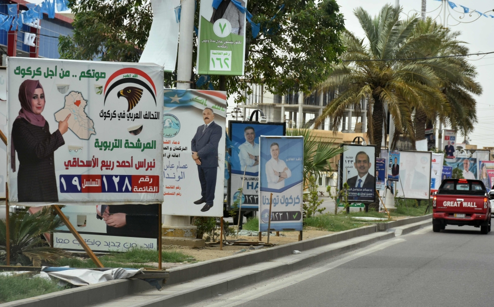 Electoral campaign posters are seen on May 8, 2018 in the multi-ethnic city of Kirkuk. Iraqi goes to the poll on May 12. / AFP / Marwan IBRAHIM