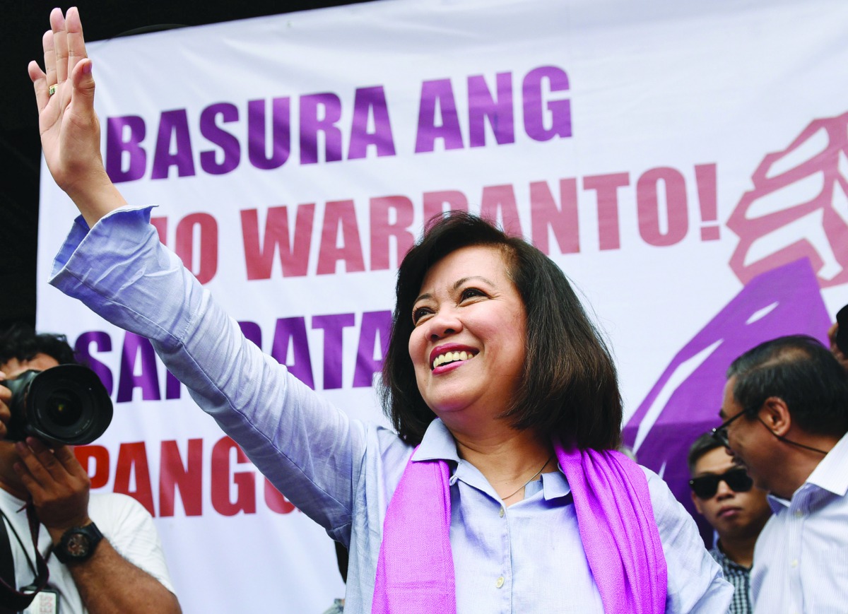 Ousted Philippine Supreme Court Justice Maria Lourdes Sereno waves to supporters at a rally outside the Supreme Court building on Taft Avenue, metro Manila, Philippines May 11, 2018. Reuters/Dondi Tawatao