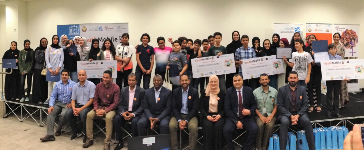 Winners of the YouthMobile Qatar competition  with officials.