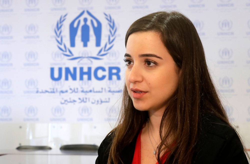 UNHCR Spokesperson Lisa Abou Khaled speaks during an interview to AFP at the UNHCR headquarters in Beirut on June 8, 2018.  AFP / Joseph EID
