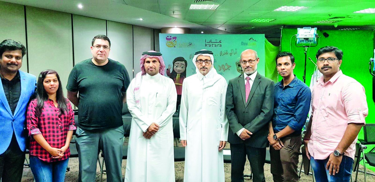 Minister of Culture and Sports H E Salah bin Ganem Al Ali with the staff of Radio Malayalam 98.6 FM. 