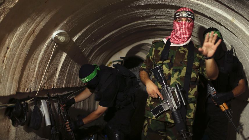 File photo: A Palestinian fighter from the Iz al-Din al-Qassam Brigades, the armed wing of the Hamas movement, gestures inside an underground tunnel in Gaza, August 18, 2014. (Reuters)