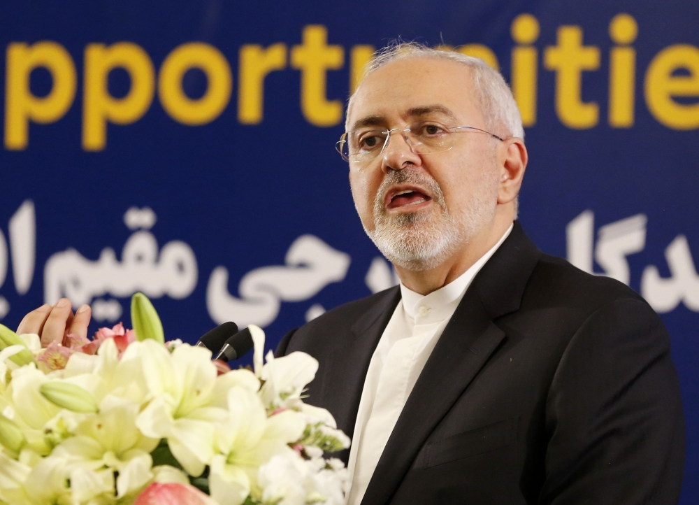 Iran's Foreign Minister Mohammad Javad Zarif speaks during a meeting with a group of economists in the capital Tehran on July 16, 2018. / AFP / ATTA KENARE
