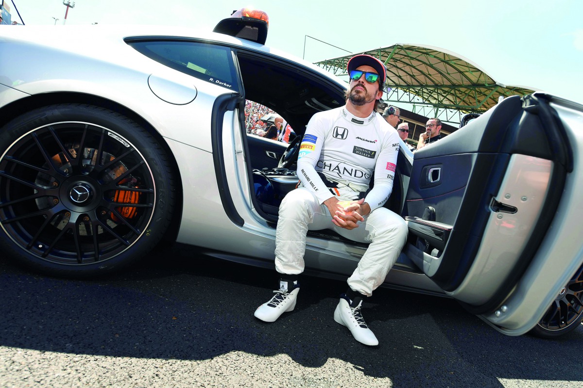  In this file photo taken on July 30, 2017 McLaren's Spanish driver Fernando Alonso waits for the start of the Formula One Hungarian Grand Prix. Fernando Alonso will retire from Formula 1 at the end of the season McLaren announced on August 14, 2018. AFP 