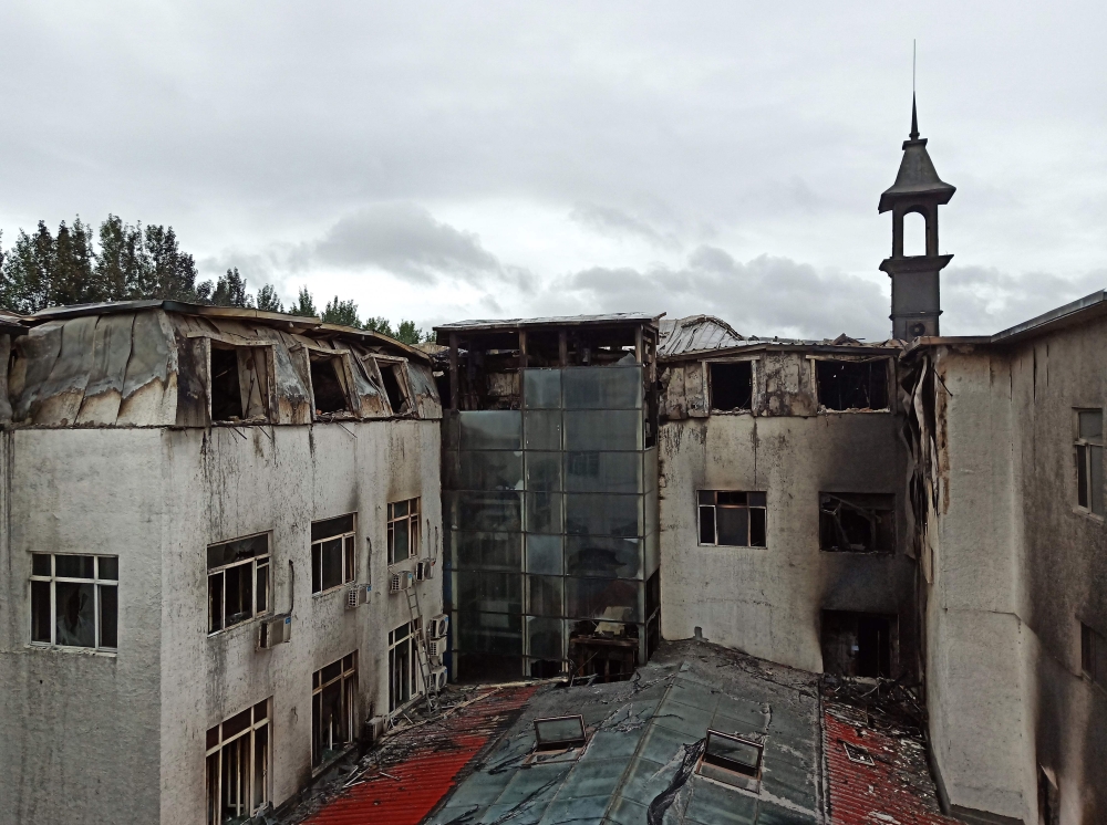 A view of the hotel after a fire left at least 18 people dead in Harbin, China's northeastern Heilongjiang province, on August 25, 2018.  AFP