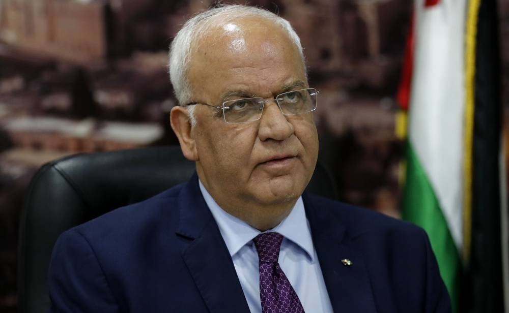 Saeb Erekat, secretary general of the Palestine Liberation Organisation, speaks to journalists in the West Bank city of Ramallah on September 1, 2018. AFP / Ahmad Gharabli
 