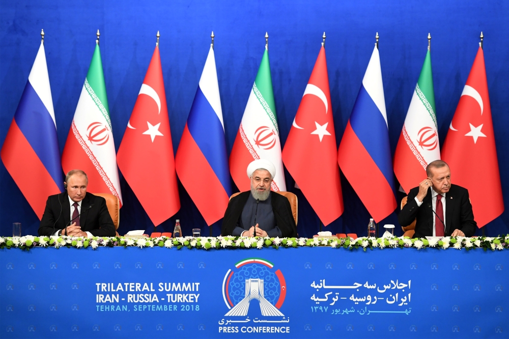President Vladimir Putin of Russia, Hassan Rouhani of Iran and Tayyip Erdogan of Turkey attend a news conference in Tehran, September 7, 2018. Kirill Kudryavtsev/Pool via Reuters